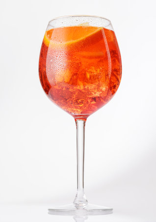 spritz cocktail with orange slice and ice on gray backgroundの写真素材