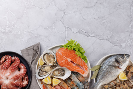 Seafood Platter Delight: Shrimps, Salmon, Oysters Galore. Flat lay with copy spaceの写真素材