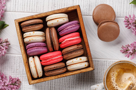 Colorful macaroons in box, arranged in a delightful display of vibrant hues and irresistible sweetnessの写真素材