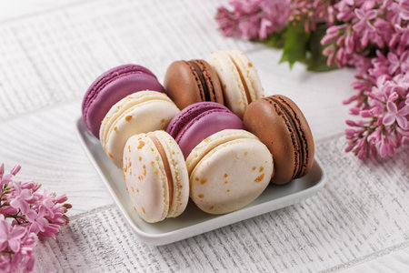 Colorful macaroons, arranged in a delightful display of vibrant hues and irresistible sweetnessの写真素材
