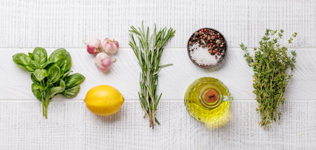 Various herbs and spices on the table, adding vibrant colors and rich aromas to the kitchenの写真素材