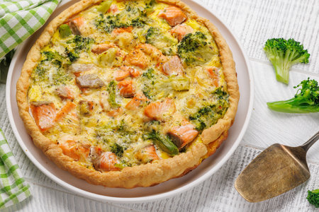 Fresh fish homemade pie with salmon and broccoliの写真素材
