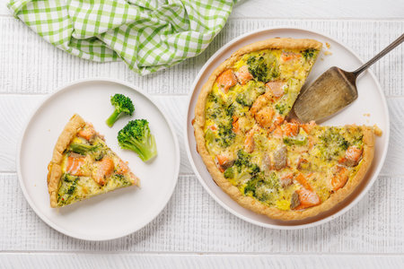 Fresh fish homemade pie with salmon and broccoli. Flat layの写真素材