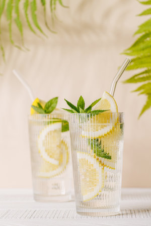 Fresh summer lemonade with lemon and mint, refreshing and vibrant drink perfect for hot daysの写真素材