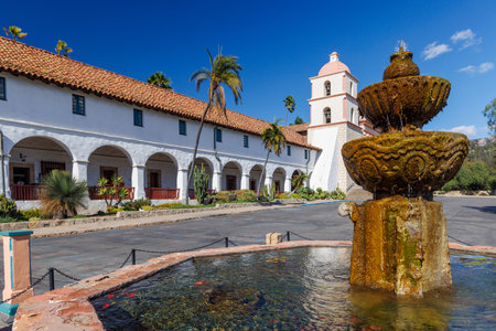 The historic Santa Barbara Mission, known as the Queen of the Missions stands majestically with its Spanish colonial architecture, twin bell towers, and beautiful rose gardenの写真素材