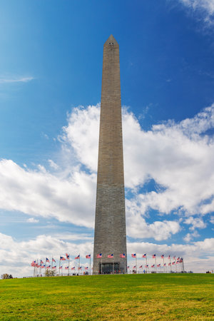 The iconic Washington Monument, a towering obelisk in the National Mall, standing tall against the sky as a symbol of American history and leadershipの写真素材