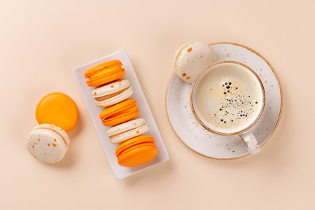 A delightful combination of freshly brewed coffee and delicate macaroons, creating a perfect balance of rich aroma and sweet indulgence. Ideal for breakfast, afternoon tea, or a cozy breakの写真素材