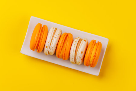 A delightful assortment of fresh macaroons with a crisp shell and creamy filling. These colorful French pastries are perfect for dessert, gifting, or indulging in a sweet treatの写真素材