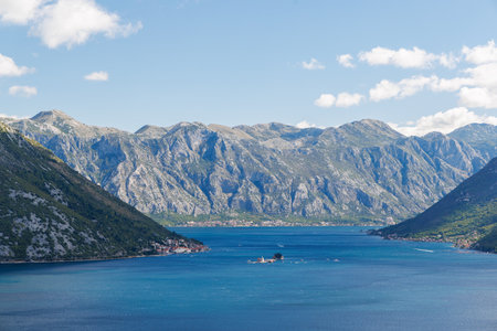 Landscape of the Bay of Kotor in Montenegro with mountains and calm blue seaの写真素材