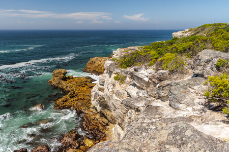 Picturesque ocean coastline in South Africa with rocky shores and beautiful natural scenery