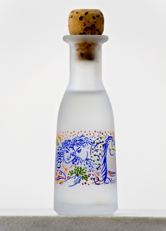 A greek traditional handmade bottle of ouzo drinkの写真素材