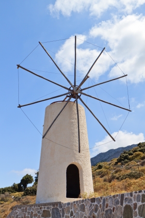 Traditional windmill at Crete island in Greeceの写真素材