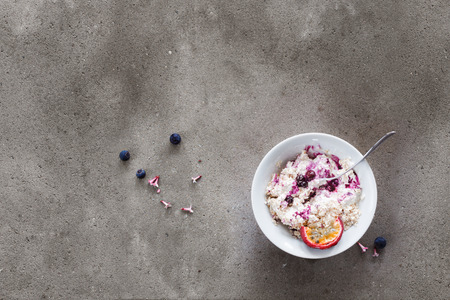 Quick breakfast with oats and fruitsの写真素材