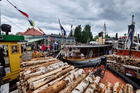 Joensuu, Finland - July 6, 2019: Traditional retro steamships regatta on the Pielisjoki river.のeditorial素材