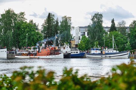 Joensuu, Finland - July 6, 2019: Traditional retro steamships regatta on the Pielisjoki river.のeditorial素材