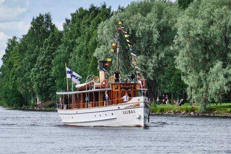 Joensuu, Finland - July 6, 2019: Traditional retro steamships regatta on the Pielisjoki river.のeditorial素材