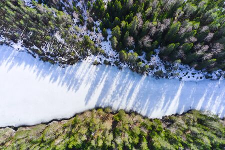Aerial view of ice-covered Kallio lake Finland. North-Karelia nature.