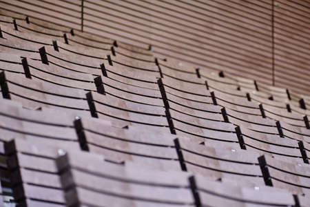 Helsinki, Finland - August 26, 2020: Wooden seats on the tribune of the Helsinki Stadiumのeditorial素材