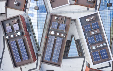 Aerial view of the solar panels on the roof of modern building in Finland.