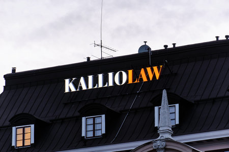 Helsinki, Finland - November 24, 2020: Kalliolaw signboard on the roof of the historical building in Central Helsinki. Kalliolaw is a law firm in Helsinki.のeditorial素材