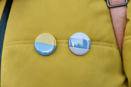 White-Blue-White anti-war flag of Russian people and Ukrainian flag togetherの写真素材