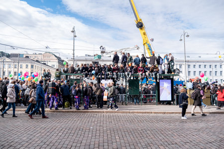 Helsinki, Finland - April 30, 2022: Finnish students celebrate Vappu. The Finnish name for May Day, Vappu. Havis Amanda sculpture with white student cap.のeditorial素材