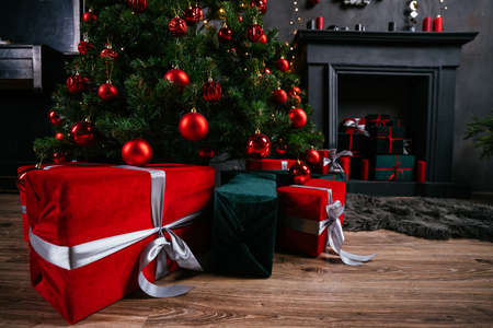 New Year 2021 interior with candles, bulbs and bokeh. Room decorated to christmas celebration....