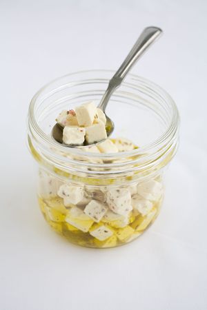 Feta Cheese marinated in olive oil and herbsの写真素材