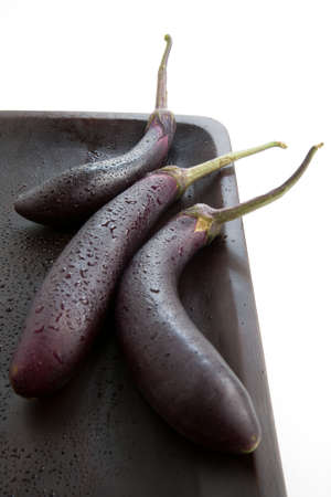 Chinese eggplant or purple egg plant, used for a healthy dish or alternative to regular eggplantの写真素材