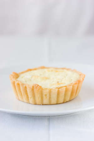 Goat cheese and onion tart with flour crustの写真素材