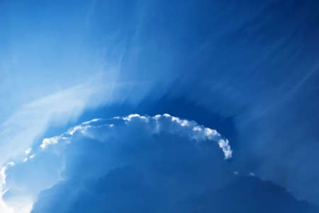 grand cloud and making its way rays of lightの写真素材