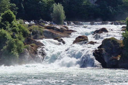 View of Rhine falls (Rheinfalls) .The famous rhine falls in the swiss near the city of Schaffhausenの写真素材
