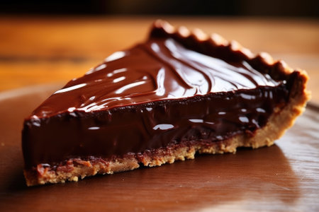 Close up of a chocolate tart on the tableの素材