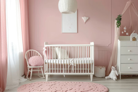 Simple, pink baby bedroom with cot and rug.の素材