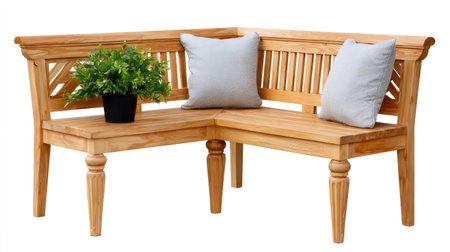 L-shaped wooden corner bench displaying soft cushions and a green plantの素材