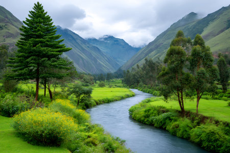 Mountain range, green valley, and Urubamba River flowing through the Sacred Valley in Peruの素材