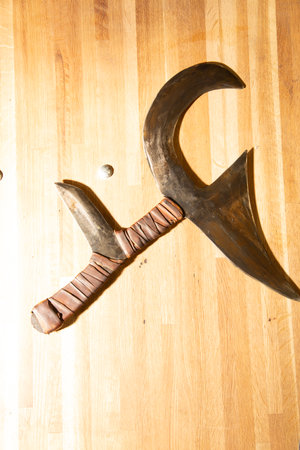 Medieval weapons on the wall of the castle, closeup of photoの写真素材