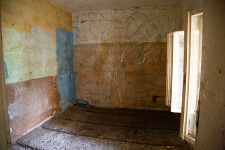 interior of an old abandoned house, view from the window.の写真素材