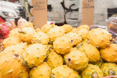 Prickly pears on display for sale at a local marketの写真素材