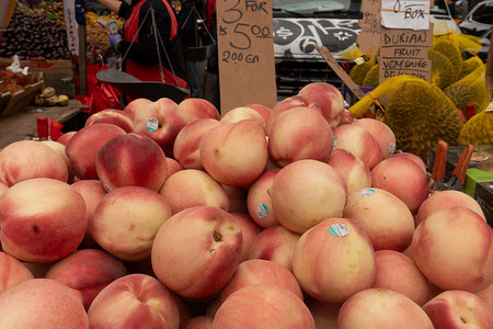 Fresh ripe peaches on the market in Barcelona, Catalonia, Spainの写真素材