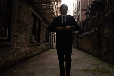 Portrait of a young business man standing in an old building.の写真素材