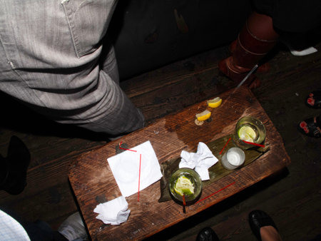 Cocktails in the bar on a wooden table in a restaurantの写真素材