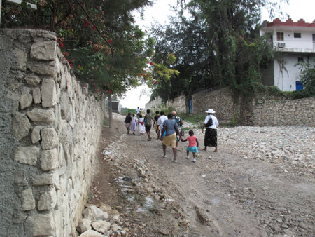 View of unknowns Nepali people walking in the street of Kathmandu in the afternoonの写真素材