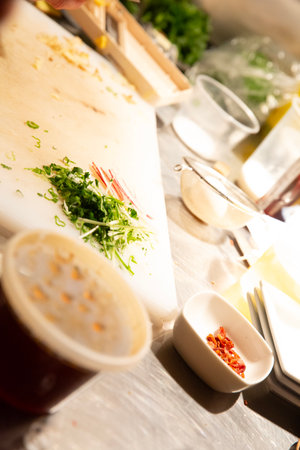 chef in restaurant kitchen preparing and decorating food, delicious dishの写真素材