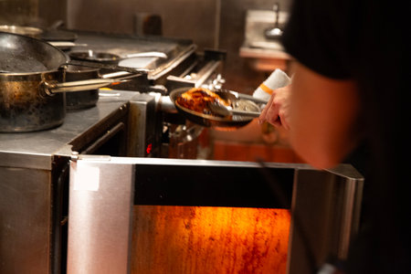 Chef at work in a restaurant kitchen. Chef at work.の写真素材