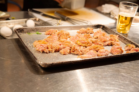 Raw pork cutlets on a baking sheet. Selective focus.の写真素材