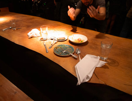 Restaurant table with food and drinks in a night club.の写真素材