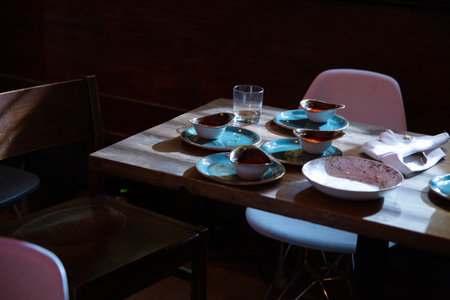 Table set for a meal in a restaurant, closeup of photoの写真素材