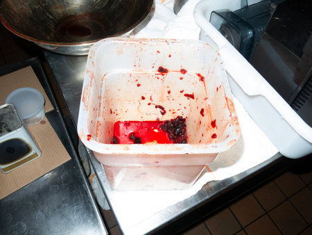 A plastic container on the kitchen table.の写真素材