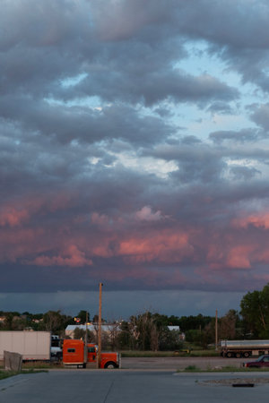 Storm clouds over a small town in the United States of America.の写真素材